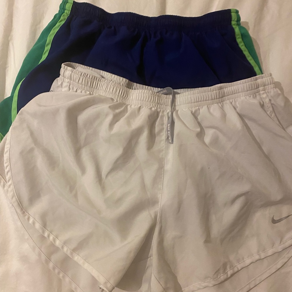 Nike running shorts selling together!